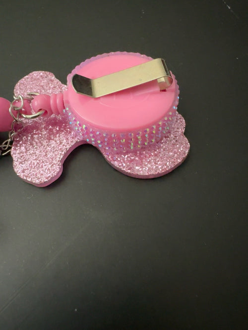 Back view of pink retractable badge reel clip