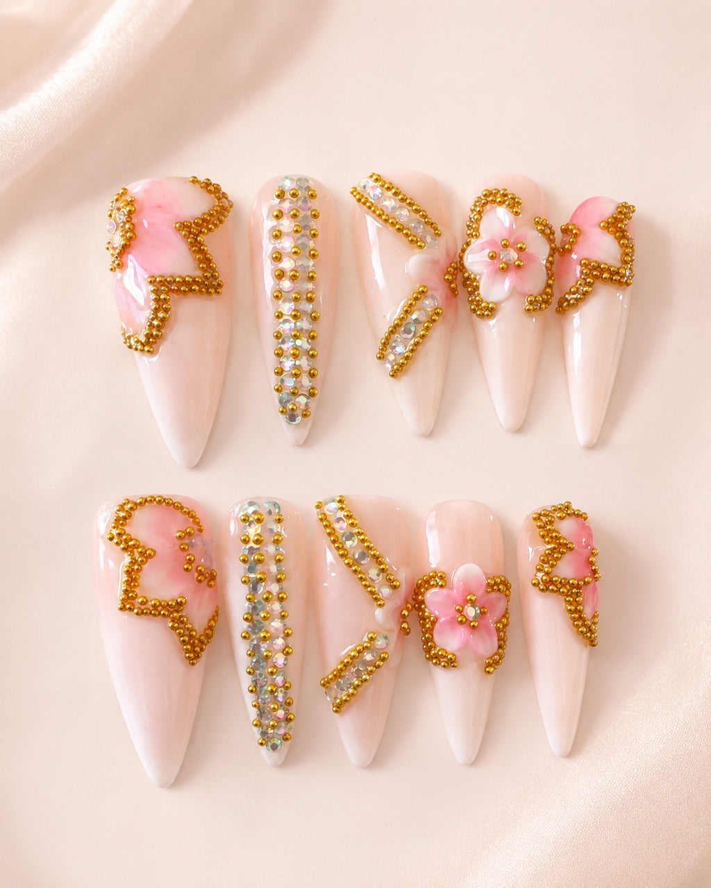 Pink floral long press-on nail set with gold bead and crystal accents