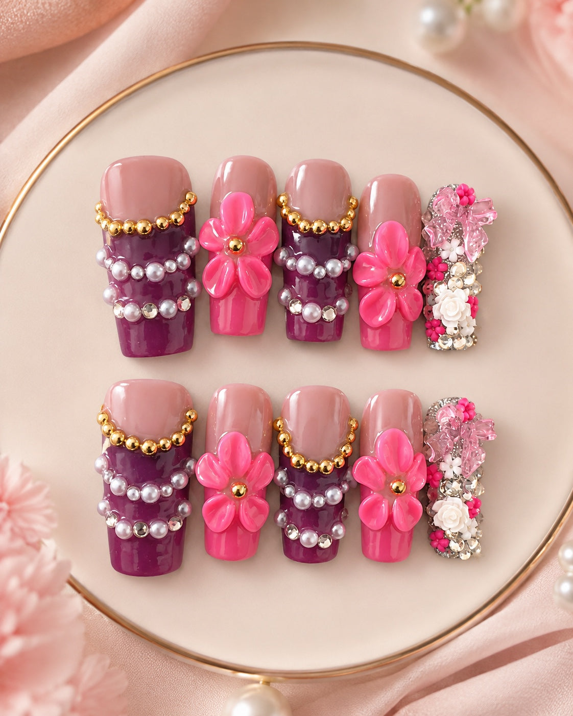 Pink and plum floral press-on nail set with pearls crystals and bow accents