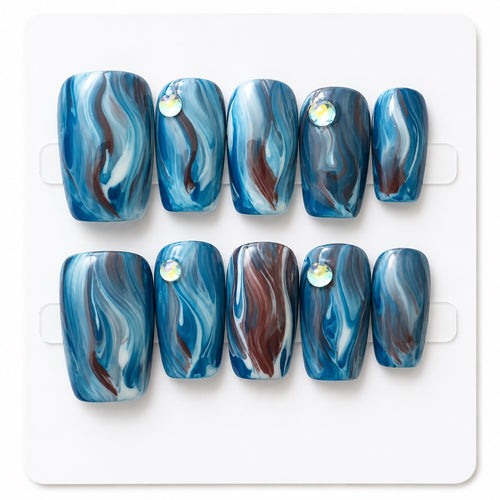 Medium blue marble square press-on nails with rhinestone accents
