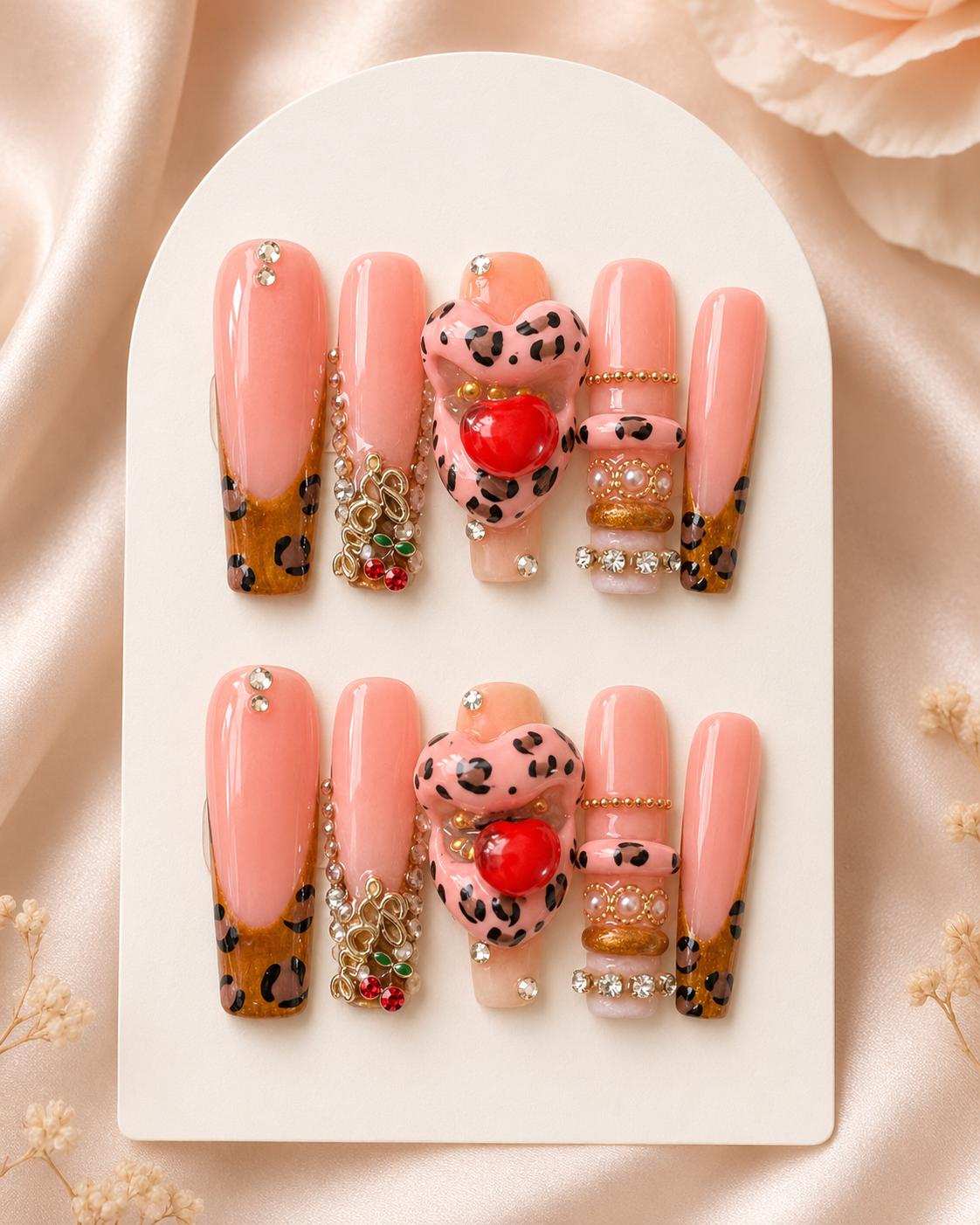 Cherry Leopard Charm Luxe pink and gold press-on nails in size medium