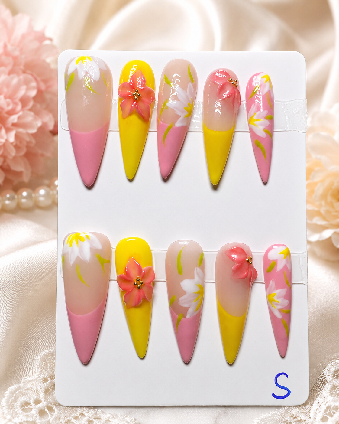 Pink Lemon Blossom press-on nails with pink and yellow floral design and 3D flower accents