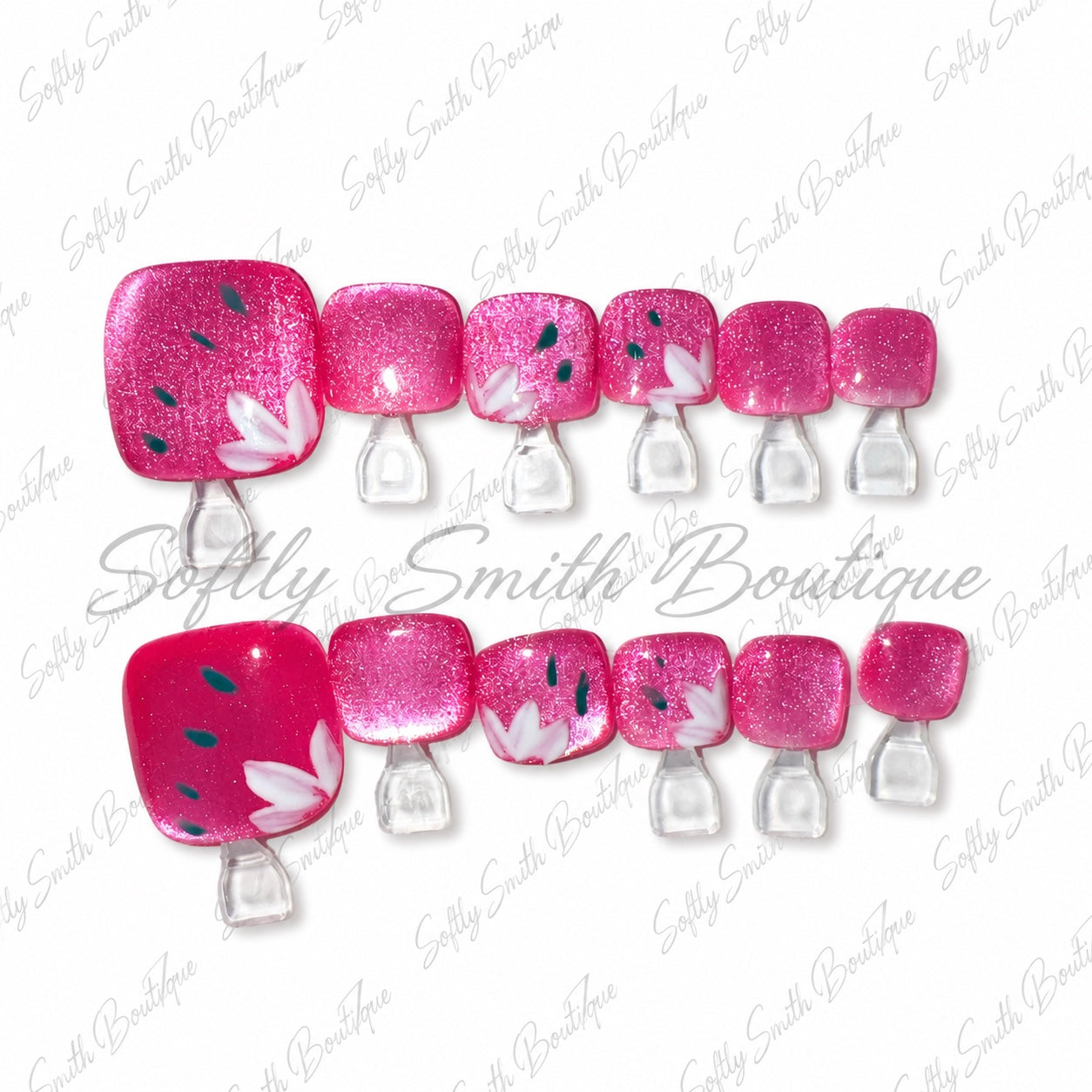 Hot pink glitter press-on toe nails with white lotus flower accents