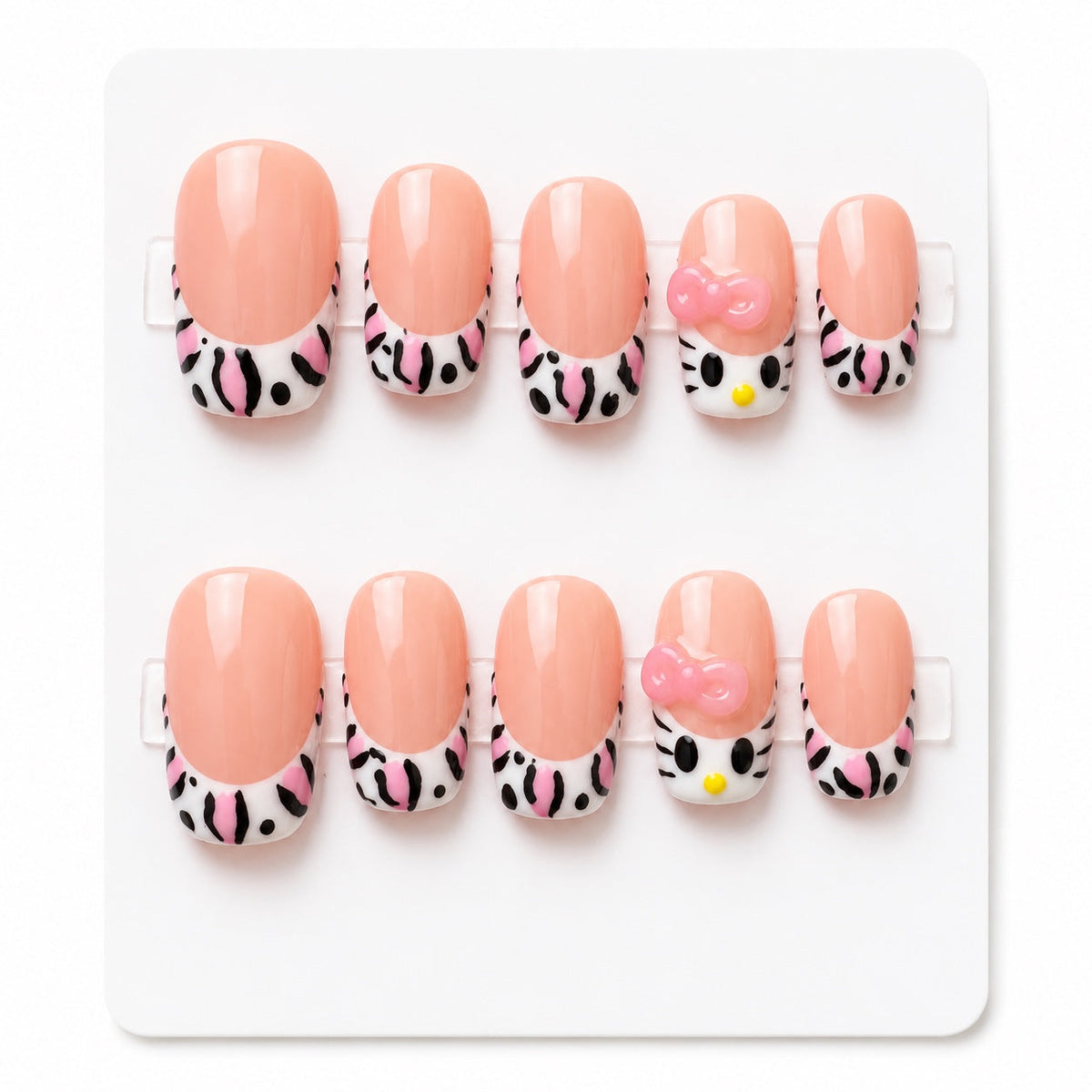 Medium peach nude short square press-on nails with pink zebra French tips and kitty accents