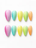 Pastel rainbow glitter press-on nails in pink aqua yellow green and orange