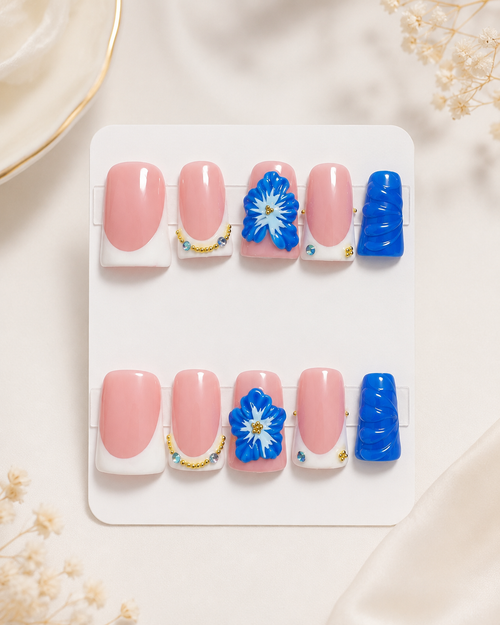 Pink, white, and blue medium duck press-on nails with floral accents