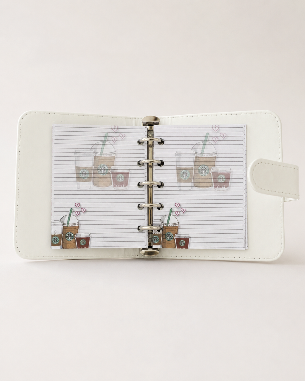 M6 binder opened with matching lined coffee insert pages