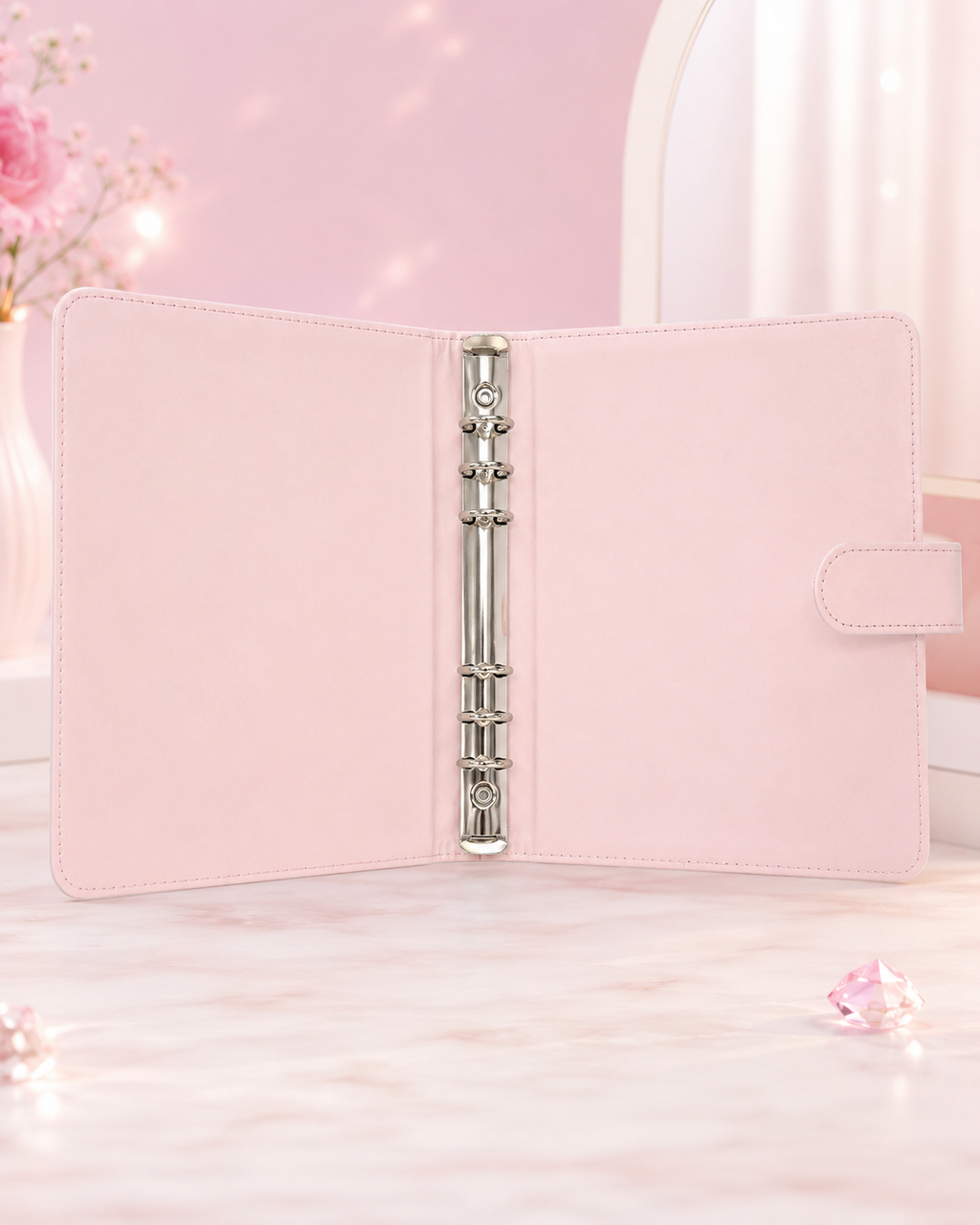 Pink A5 binder open interior with six-ring mechanism