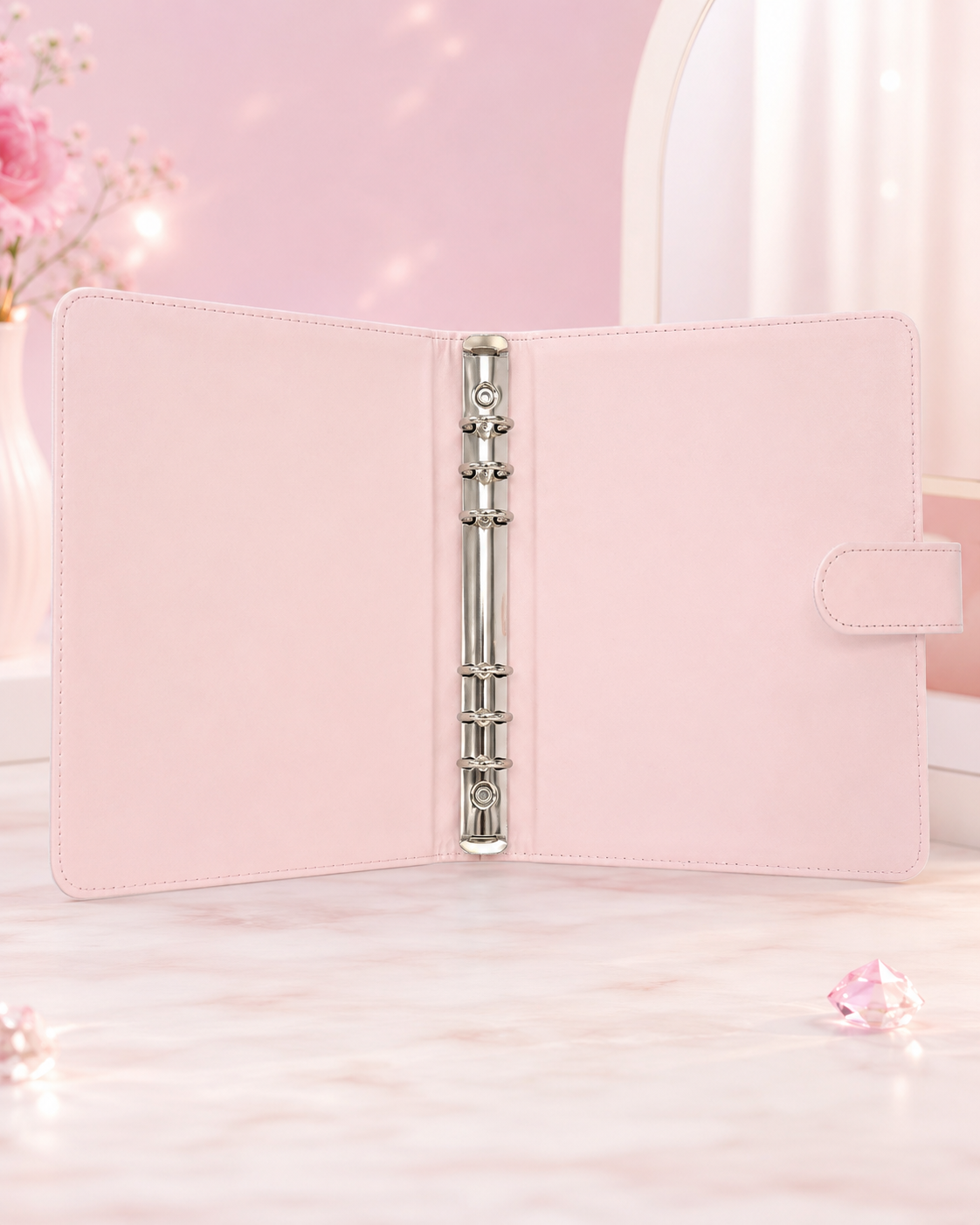 Pink A5 binder open interior with six-ring mechanism