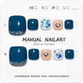 Teal, nude, and white press-on toe nails with glitter and silver heart accents